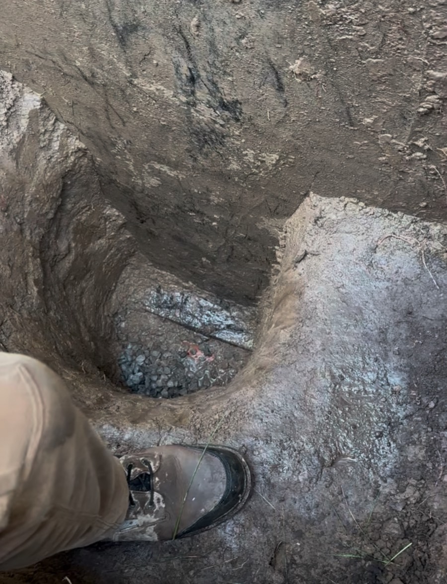 Hand dug shaft excavated down to the weeping tile